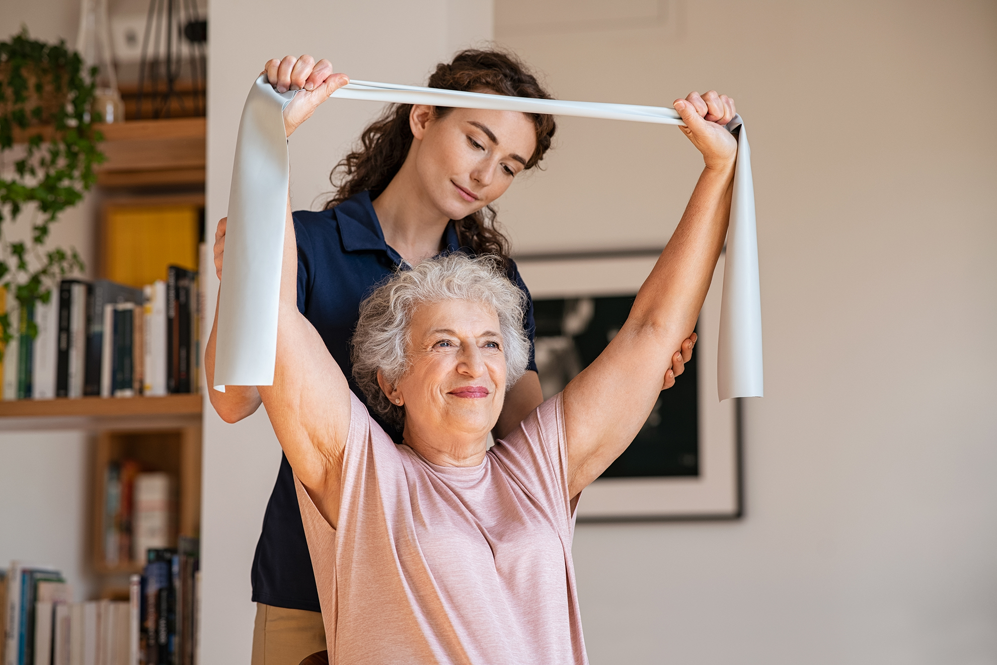 a woman exercising with a band